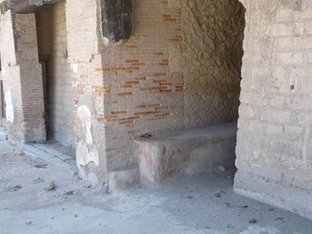 Decumanus Maximus, Herculaneum. August 2013. Looking west along north side, with bench in doorway numbered 4. Photo courtesy of Buzz Ferebee.